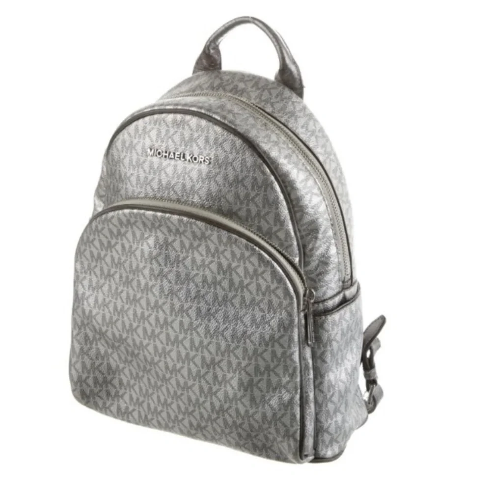 Michael Kors Silver shimmer Monogram Backpack shiny zipper leather compartments‎